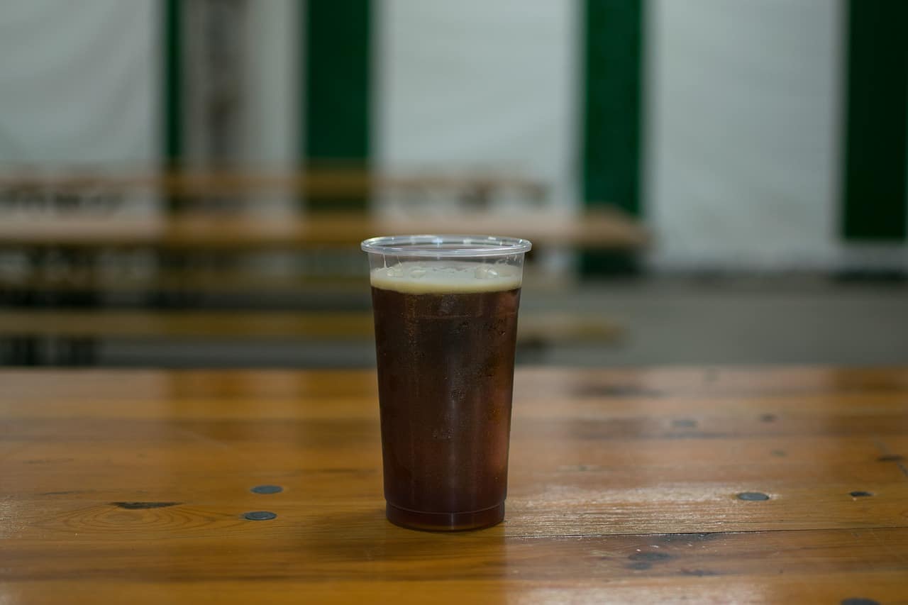 beer sitting on wood table; types of beer