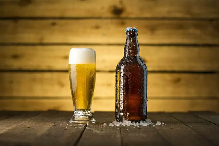 beer bottle and beer in glass